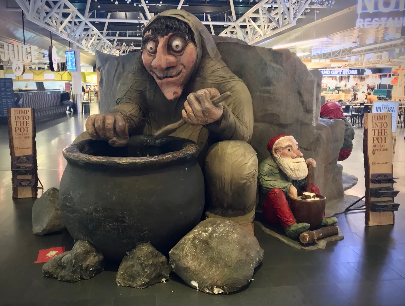 A wooden sculpture of the cheeky Icelandic Yule Lads in their traditional outfits